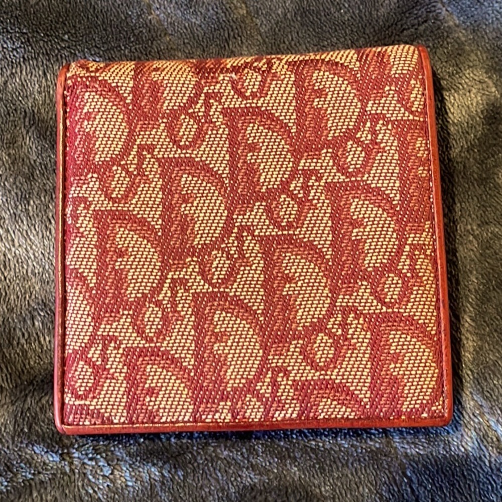 Christian Dior Monogram compact wallet in red